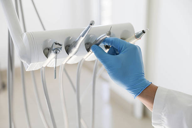 Professional Tooth Extraction technician working in San Benito, TX